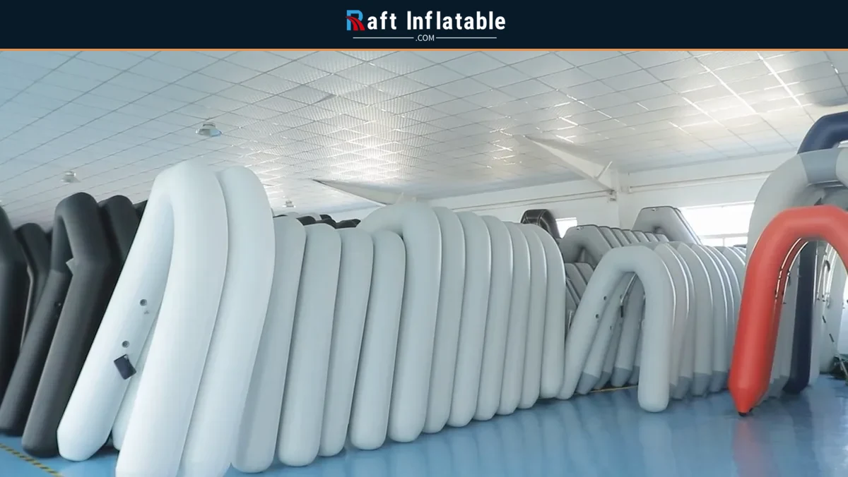 Inflatable boat tubes staged upright inside the supplier workshop